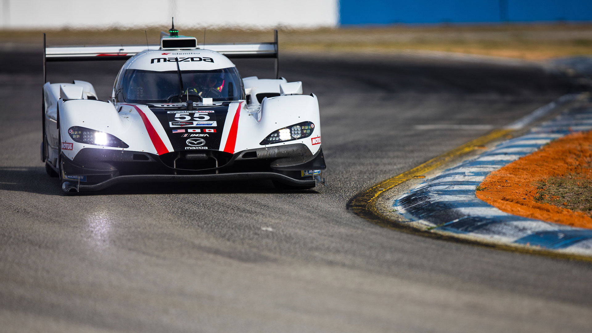 Mazda approaching a corner